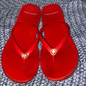 Red used good condition flip flops
